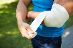 personal injury - boy wrapping elbow