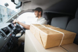 food delivery guy on a car