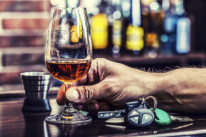 The drunk driver already faces criminal charges. Do I need to file an insurance claim to hold him liable for my injuries?